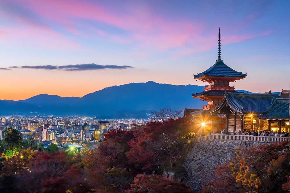 Kyoto's famous temple frames the city at night