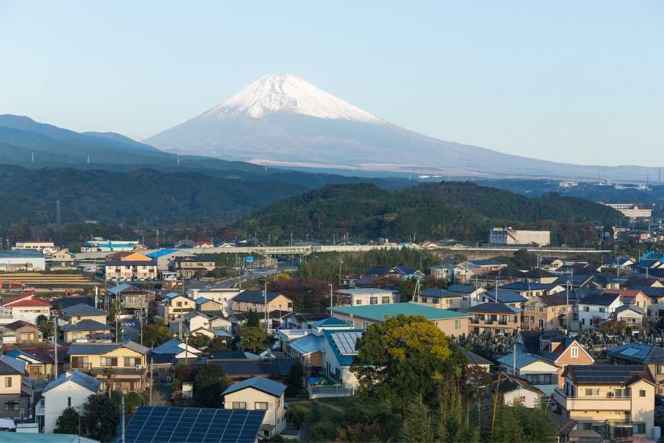 Mount Fuji looms over the Japanese city of Shizuoka