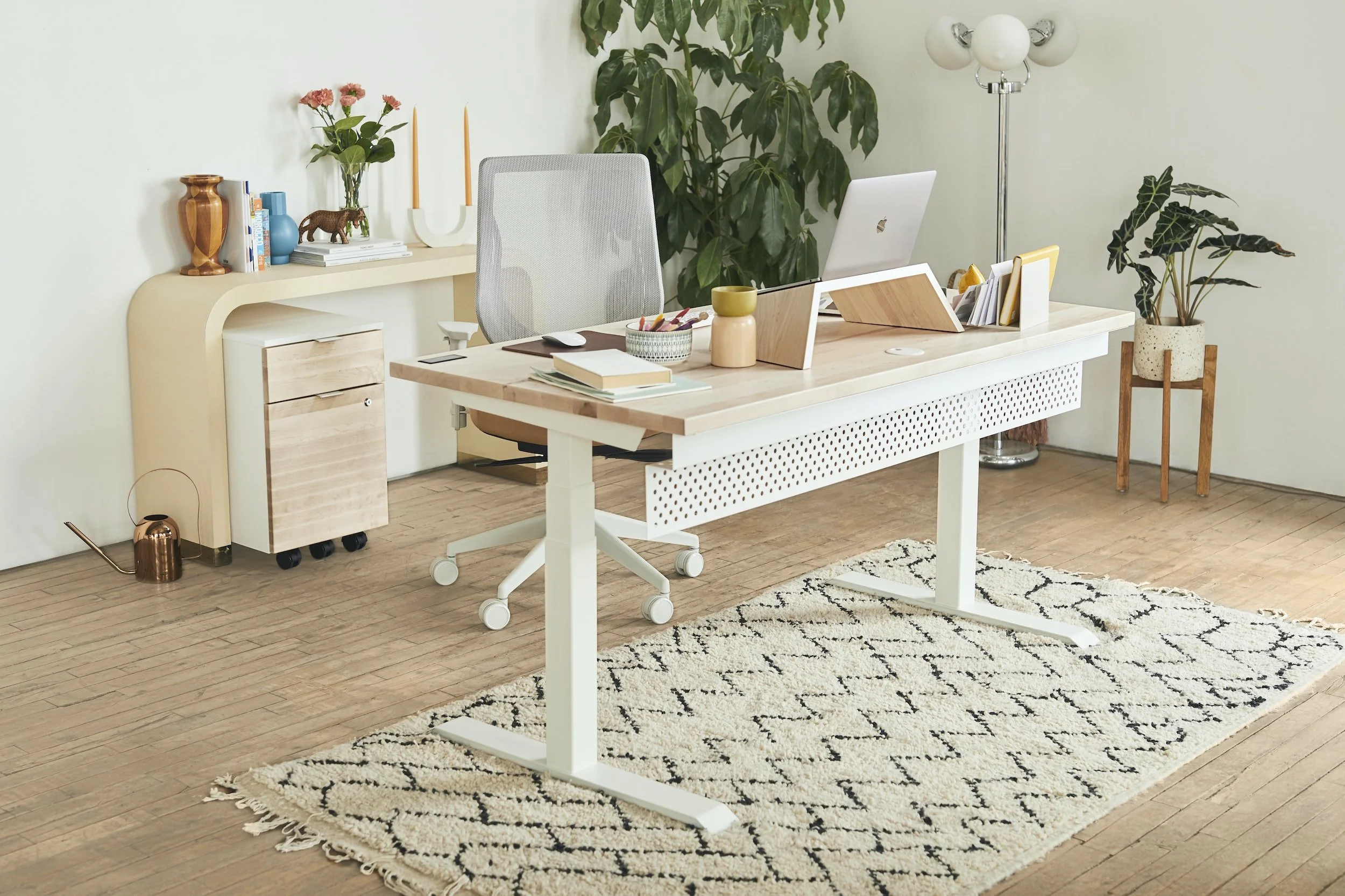 Organized and bright modern home office with lots of peach tones