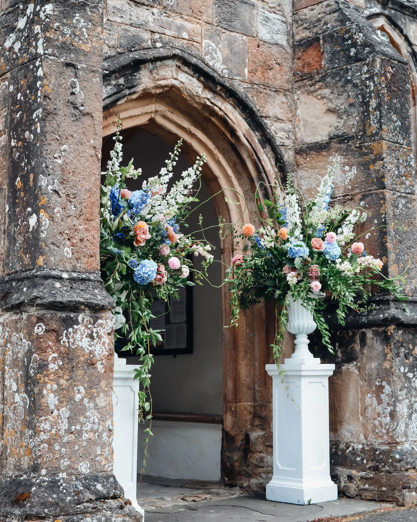 Just over a year ago ✨ Chris &amp; Sarah got married at Crowcombe Court and these urns greeted their guests at the church.

I love urns outside a church, they feel so regal and special. This weekend we have urns once more!

#wedding #ceremonydecor