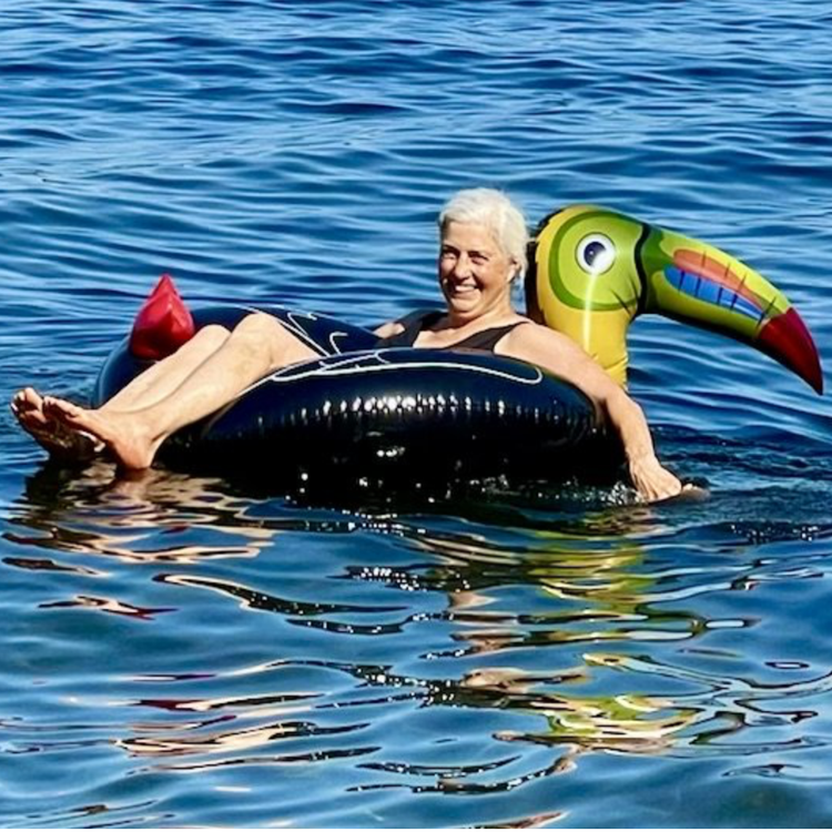 Libby Sinclair, Hidden Beach steward, floating in the lake