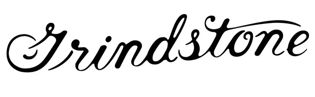 Custom hand-lettered logo for Grindstone, designed by Murphy Empire through a bespoke typography process.