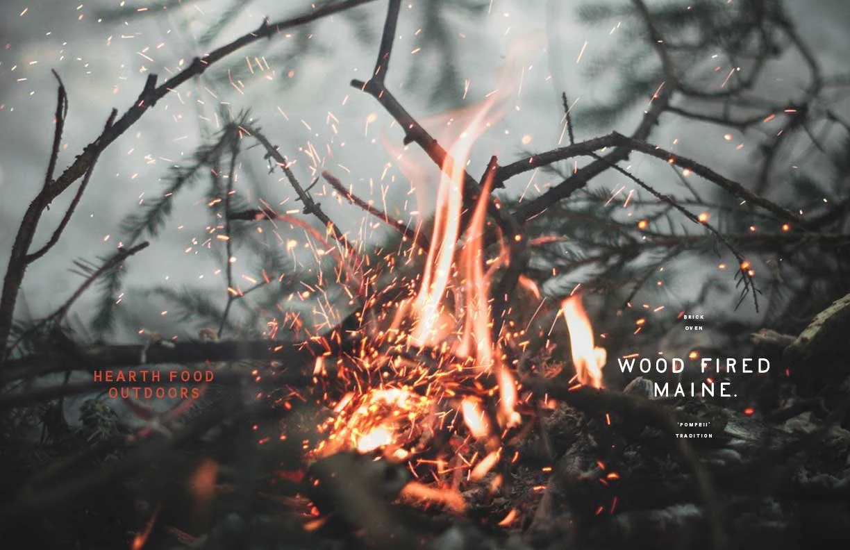 Wood Fired Maine brand identity development: logotype and custom letterform applied to pine wood camp fire imagery layout for print promotions