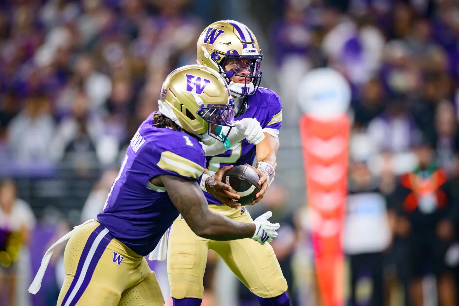UW Football Barks, Then Bites, Beat Cougars 59-24 In Apple Cup