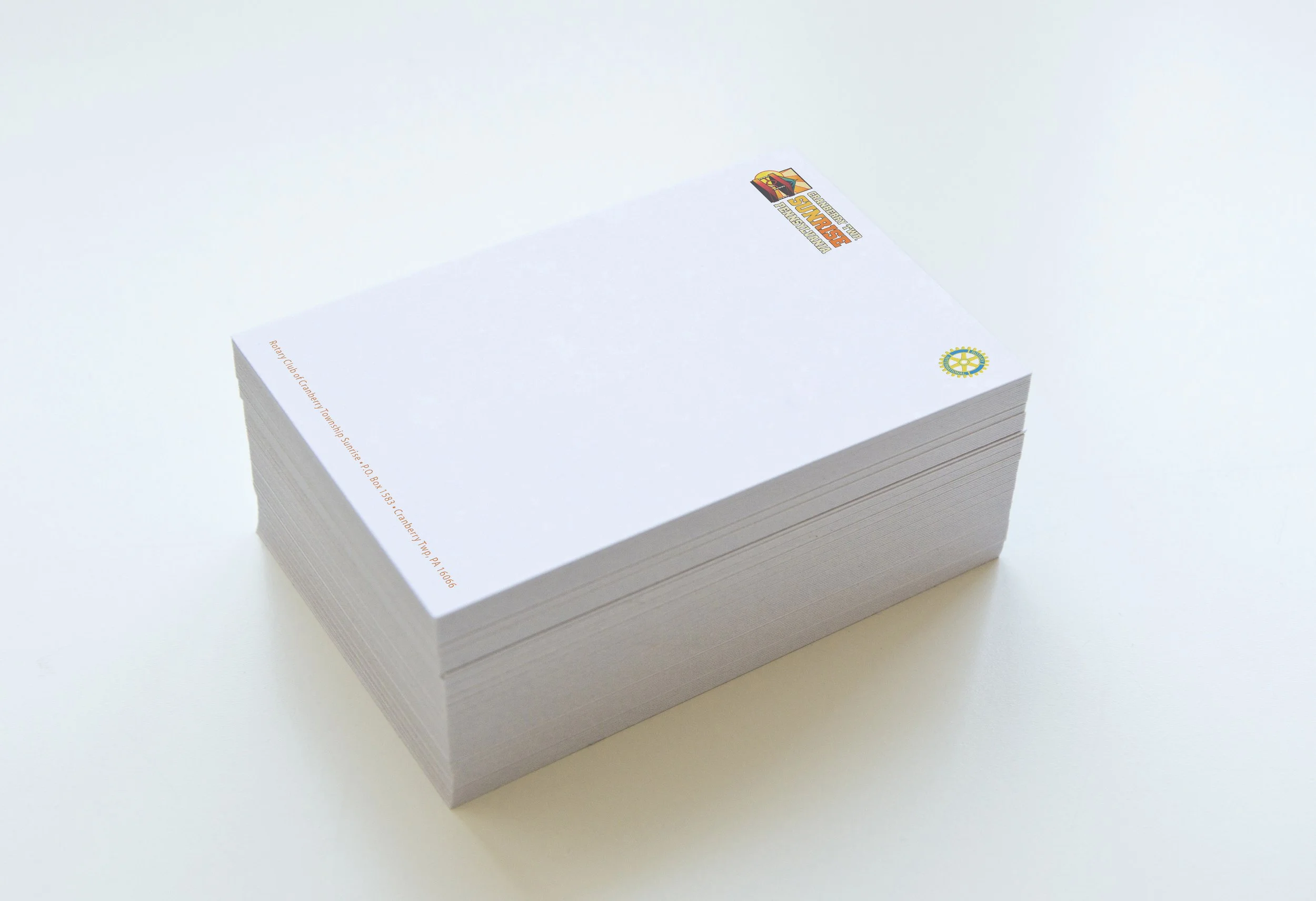 Graphic designer Todd Hagerich featuring Cranberry Sunrise branding, letterhead, envelope, banner, & charity poster samples.