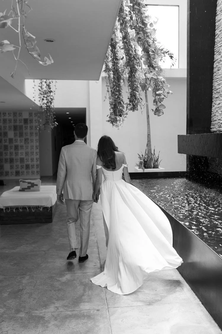 bride and groom walking to ceremony