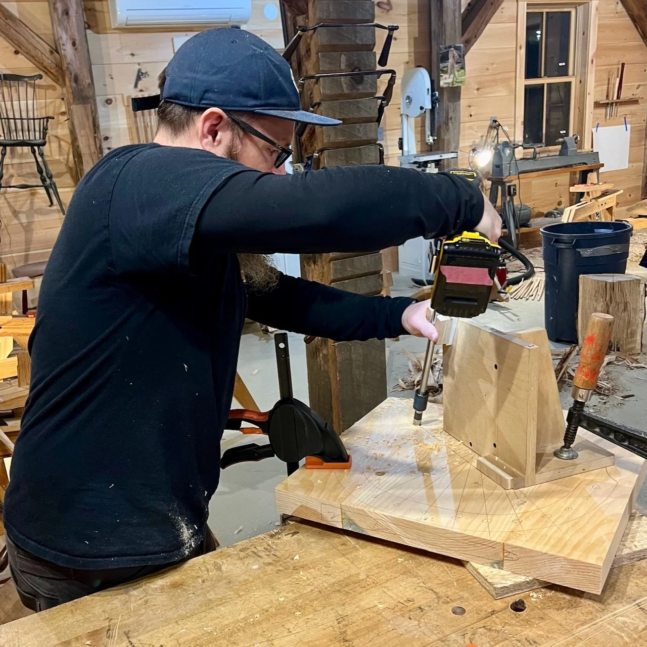 Drilling mortises in the seat using a jig