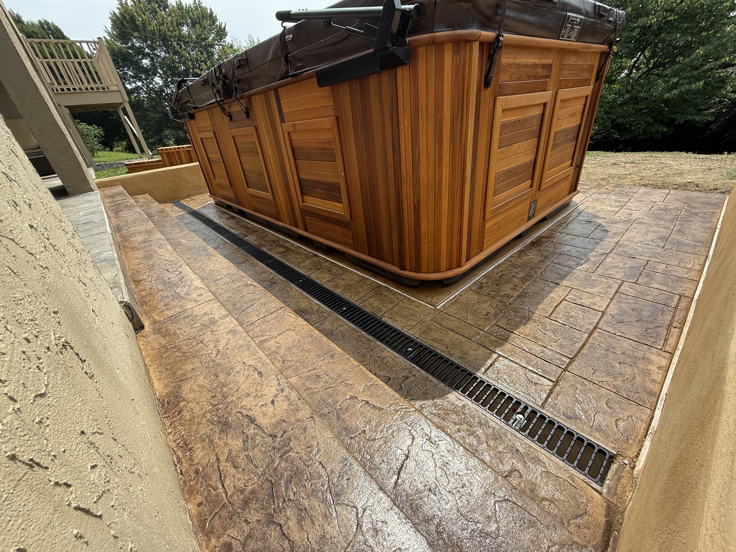 Stamped ashlar slate with stone textured steps and drain. Lancaster, PA