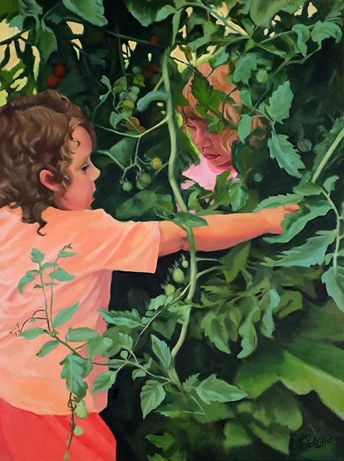 A child and an adult face each other closely among dense green plant leaves, appearing to be in a garden or forest, with the child's arm extended toward the adult.
