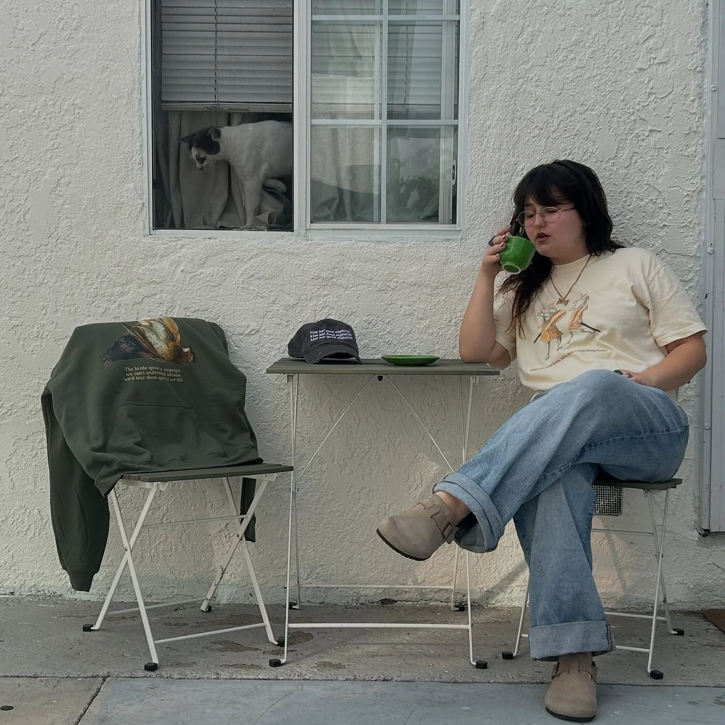 been procrastinating announcing this due to nerves but here it is: my poetry now lives on shirts, hoodies, and hats that you can have and wear.

when i first started designing these, i was absolutely terrified. i&rsquo;ve always loved fashion &amp; d