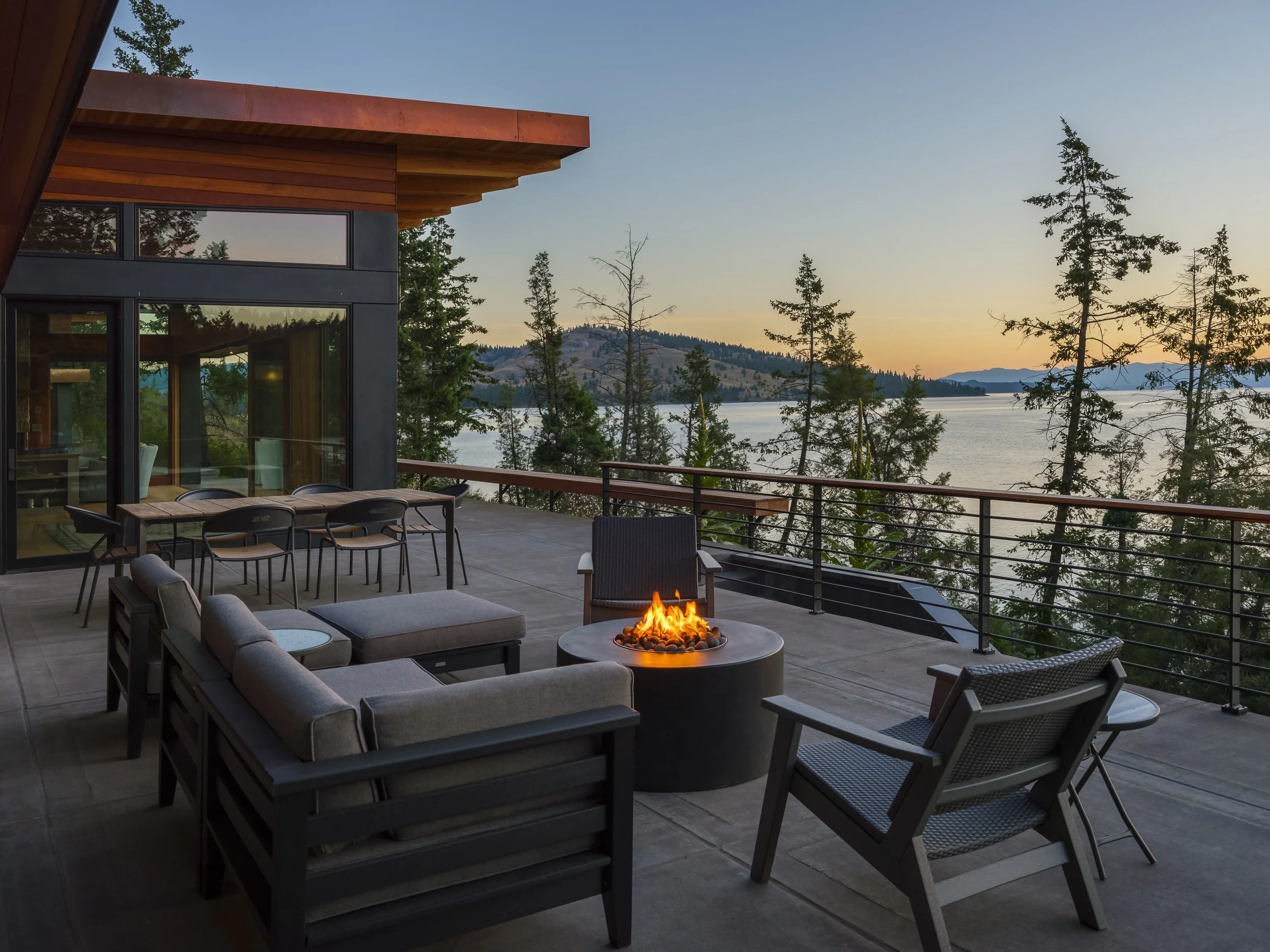 High-end architectural photography of modern residential exterior on Flathead Lake. Polson, Montana