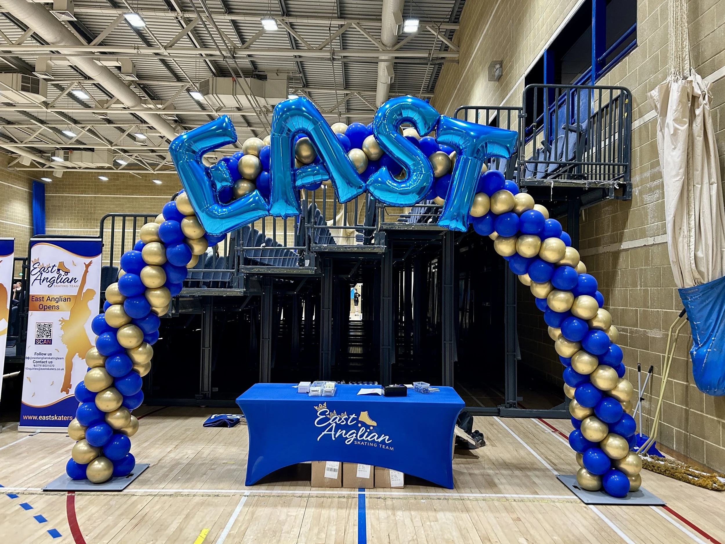 gold and blue ballon arch for a competition in haywards heath