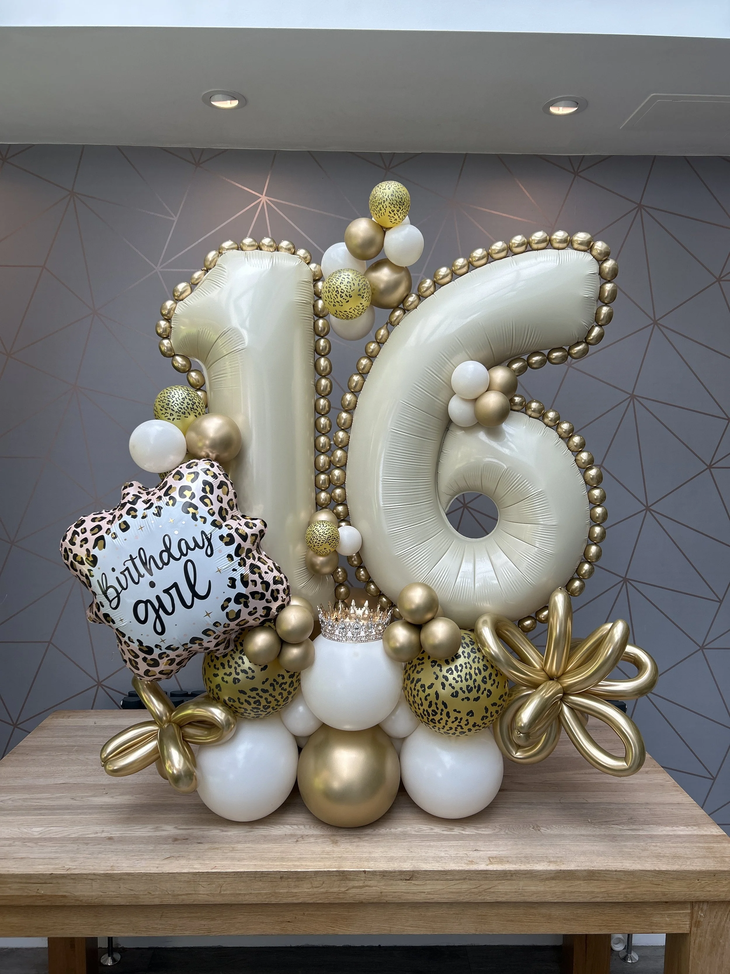 16th birthday balloon stack with leopard print