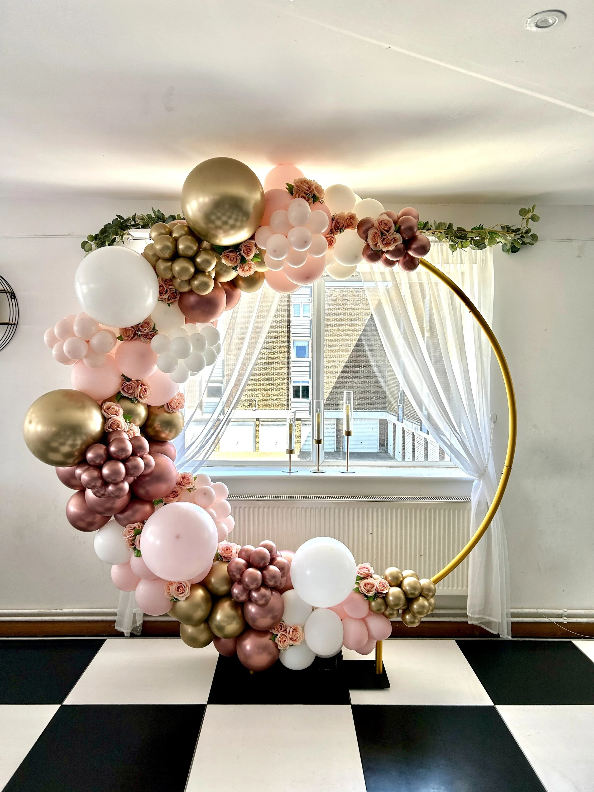 rose gold white pink and gold balloon hoop for a 50th birthday