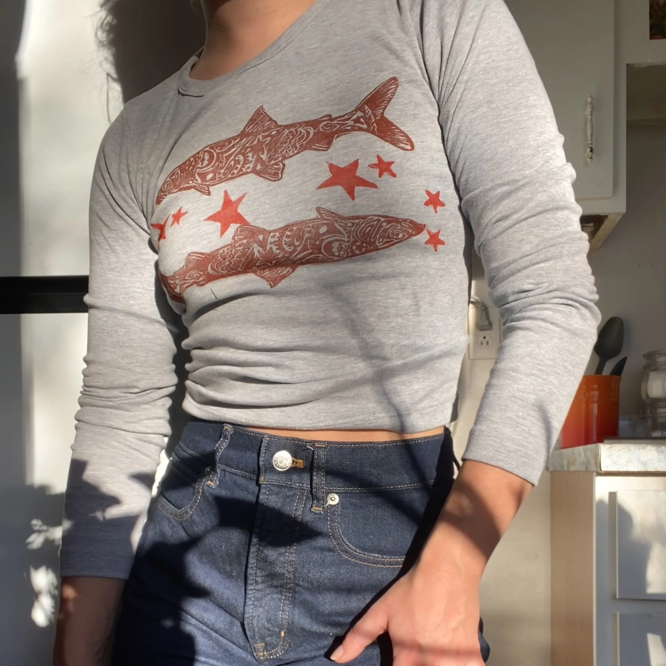 herring constellation long sleeve baby tee