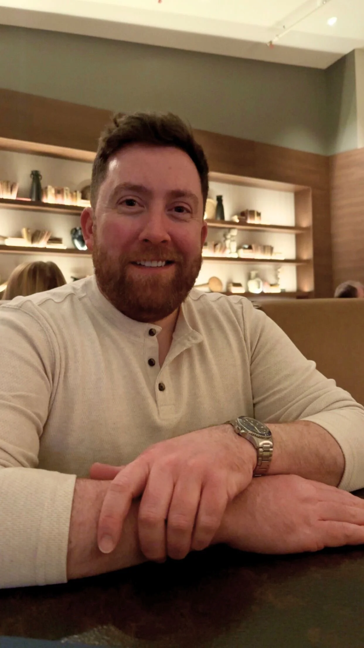 Owner Robert, friendly man with beard smiling at camera