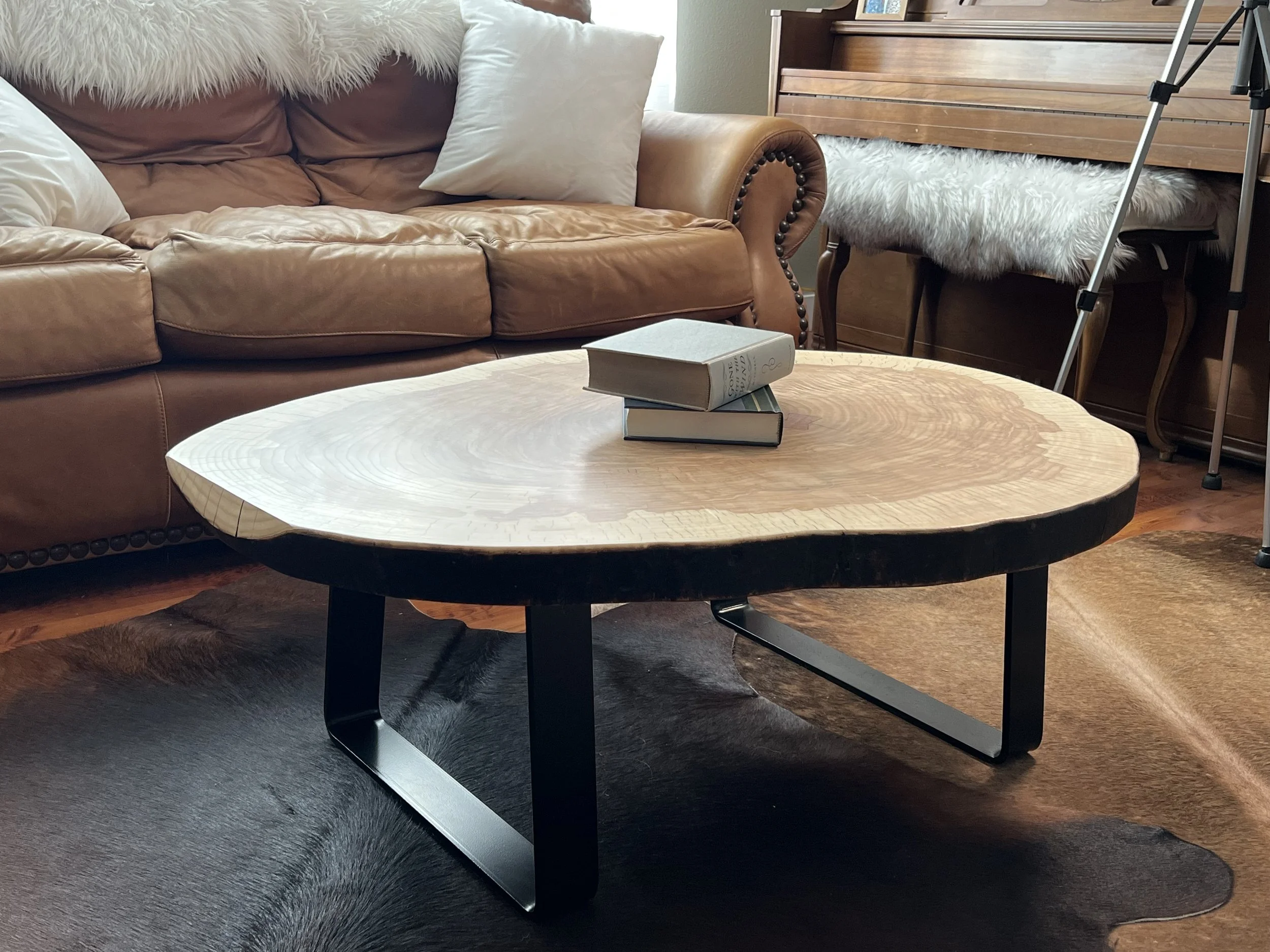 Large ash live-edge coffee table with visible tree rings