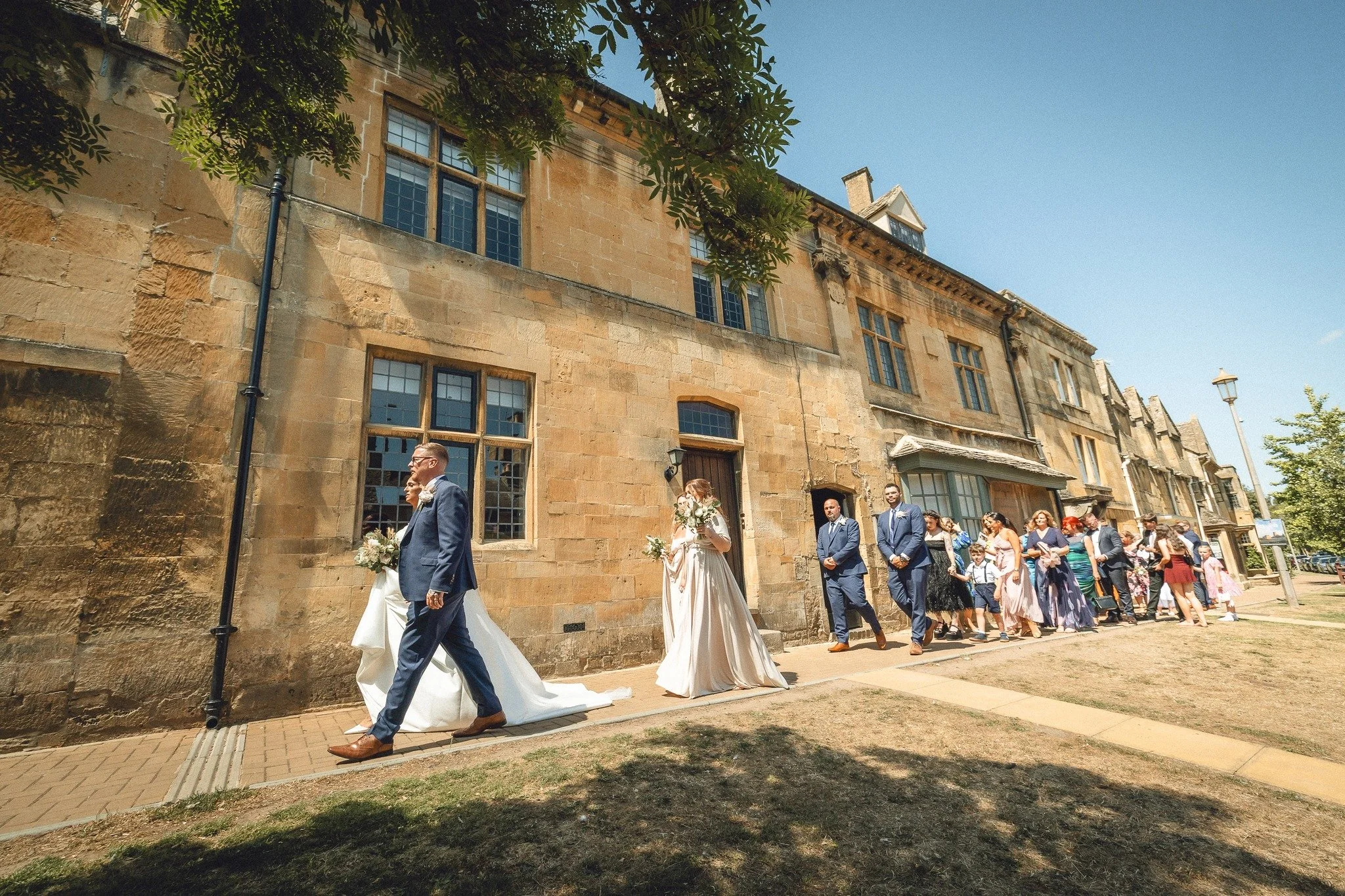 Emily &amp; Dale making their first journey together
They made their way on foot  from the the grand St James Church to the Cotswold House Hotel, through beautiful the streets of Chipping Campden, on an equally beautiful summer's day.