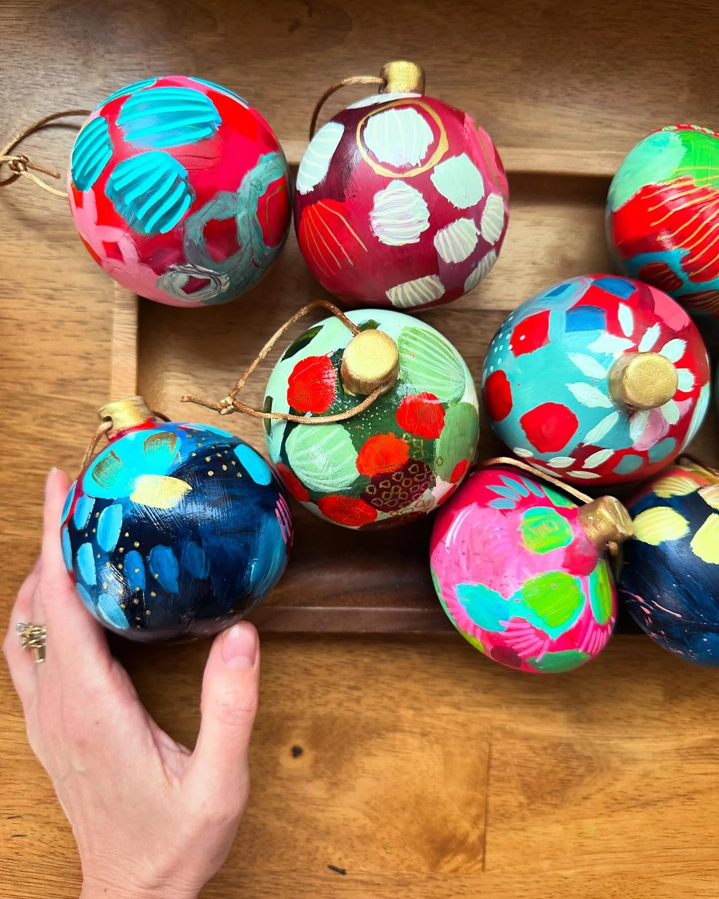 Each one of these ornaments is a small labor of love. 

They were unplanned- a spontaneous moment of experimenting, play and then,- what do you know- delight! I had no idea I would enjoying creating these so much. Each one is like a mini canvas. 

Th