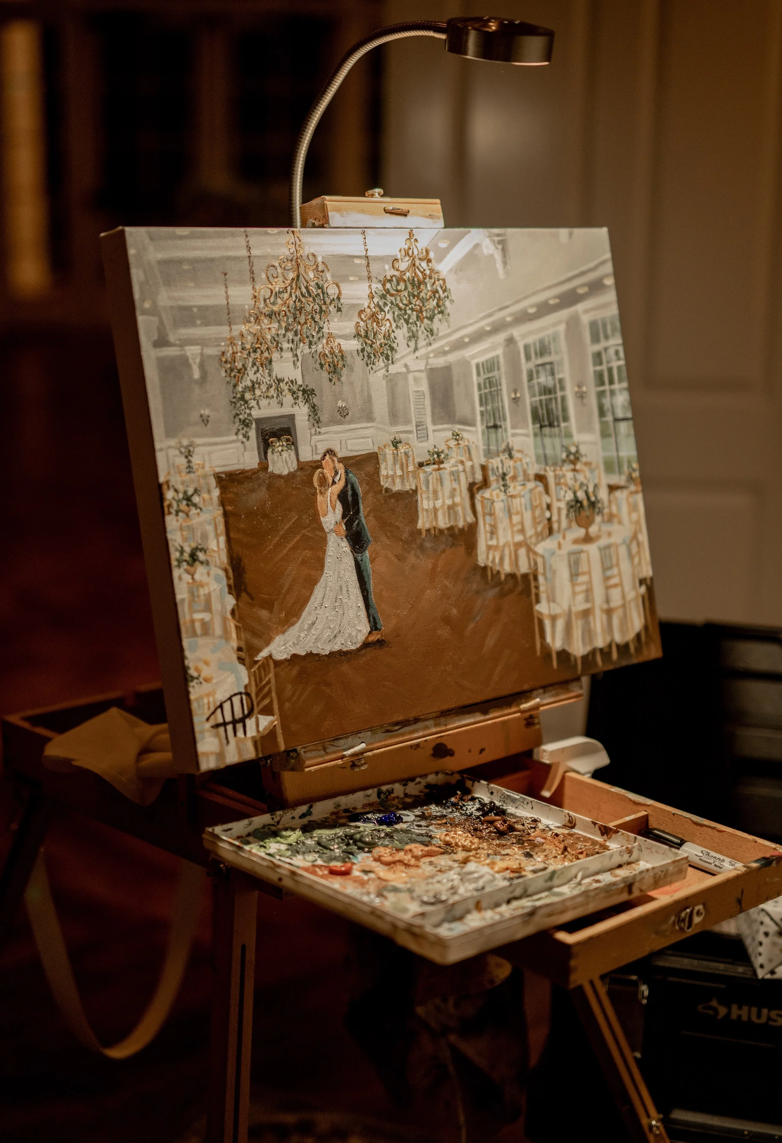 Painting of a bride and groom dancing in a decorated wedding reception hall, with tables and chandeliers.