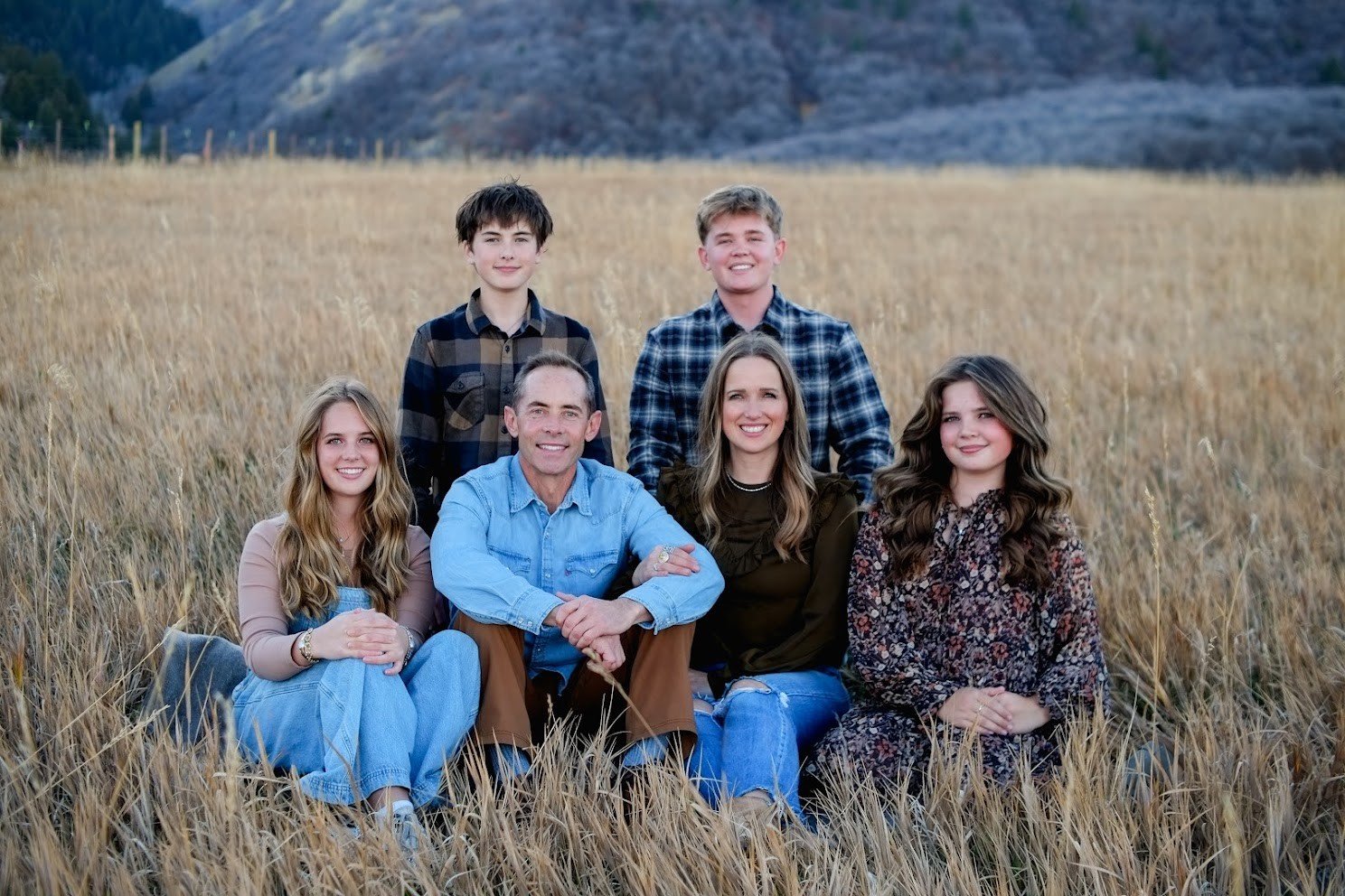 Tyler Smith with his wife, Jessa, and their four children