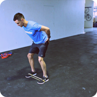Resisted band walks for gluteus medius strengthening at Evolutio Sports Physio in Richmond, Melbourne