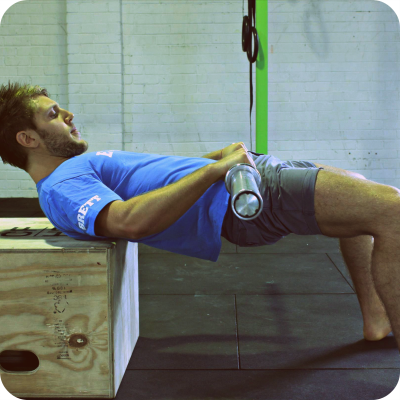 Barbell hip thrust for gluteus maximus strengthening in the rehabilitation gym at Evolutio Sports Physio Richmond