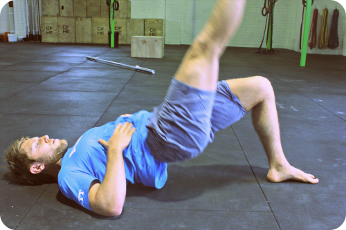 Single leg glute bridge for hip rehabilitation at Evolutio Sports Physio Richmond, Melbourne
