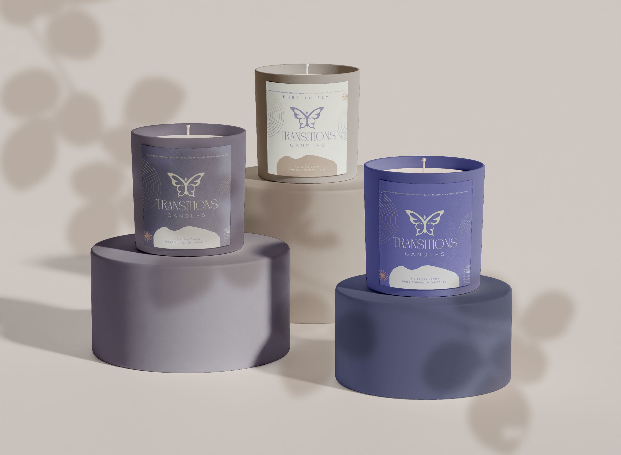 tran candle on podiums.jpg