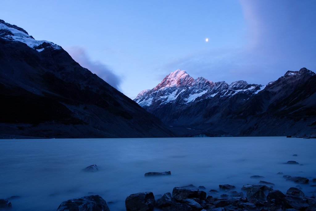 The last light of the day kisses the top of Mt Cook from Hooker Lake