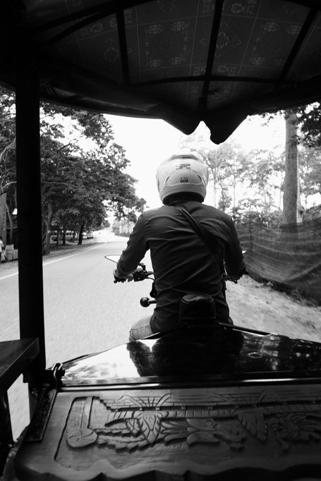Day 1: Our view of Dom the tuk tuk driver