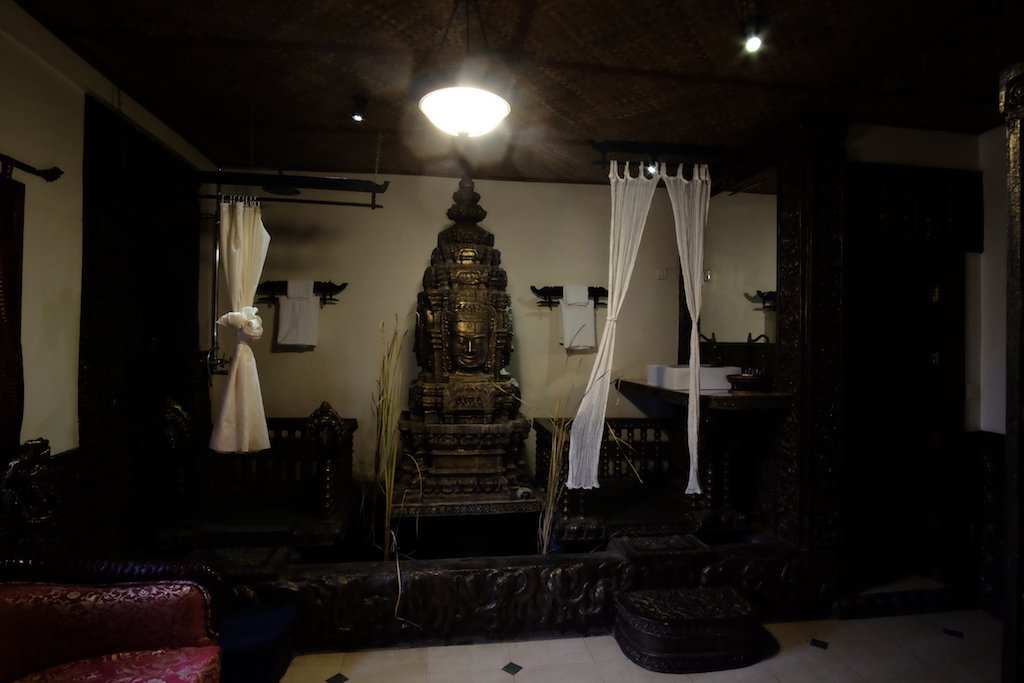 Bathroom and shower, and Bayon faces, and pond
