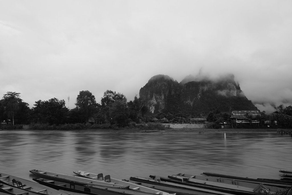 Boats, river, mountains, rain