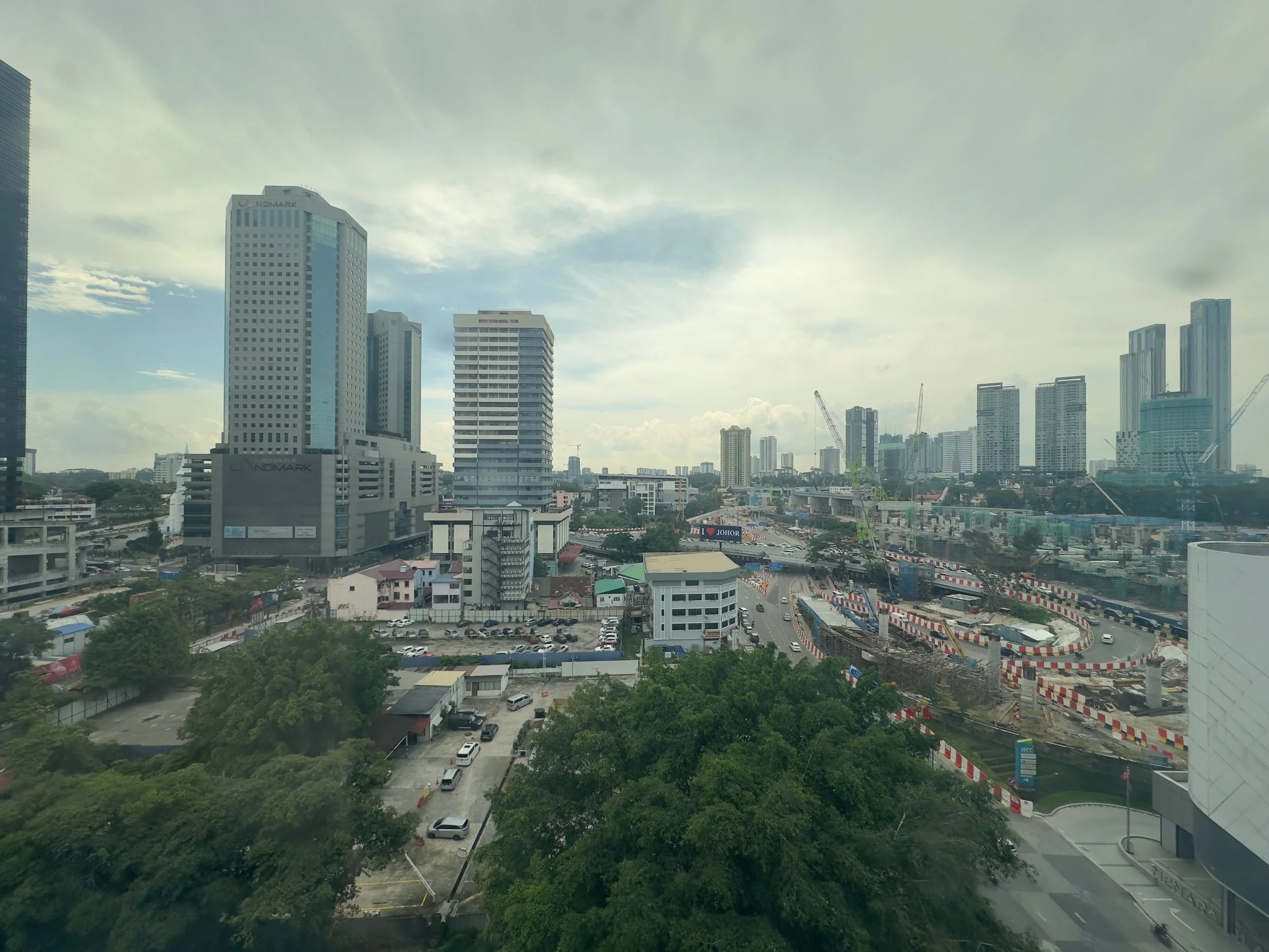 View from Room 621, Fives Hotel, looking north over the oaks for the new train line