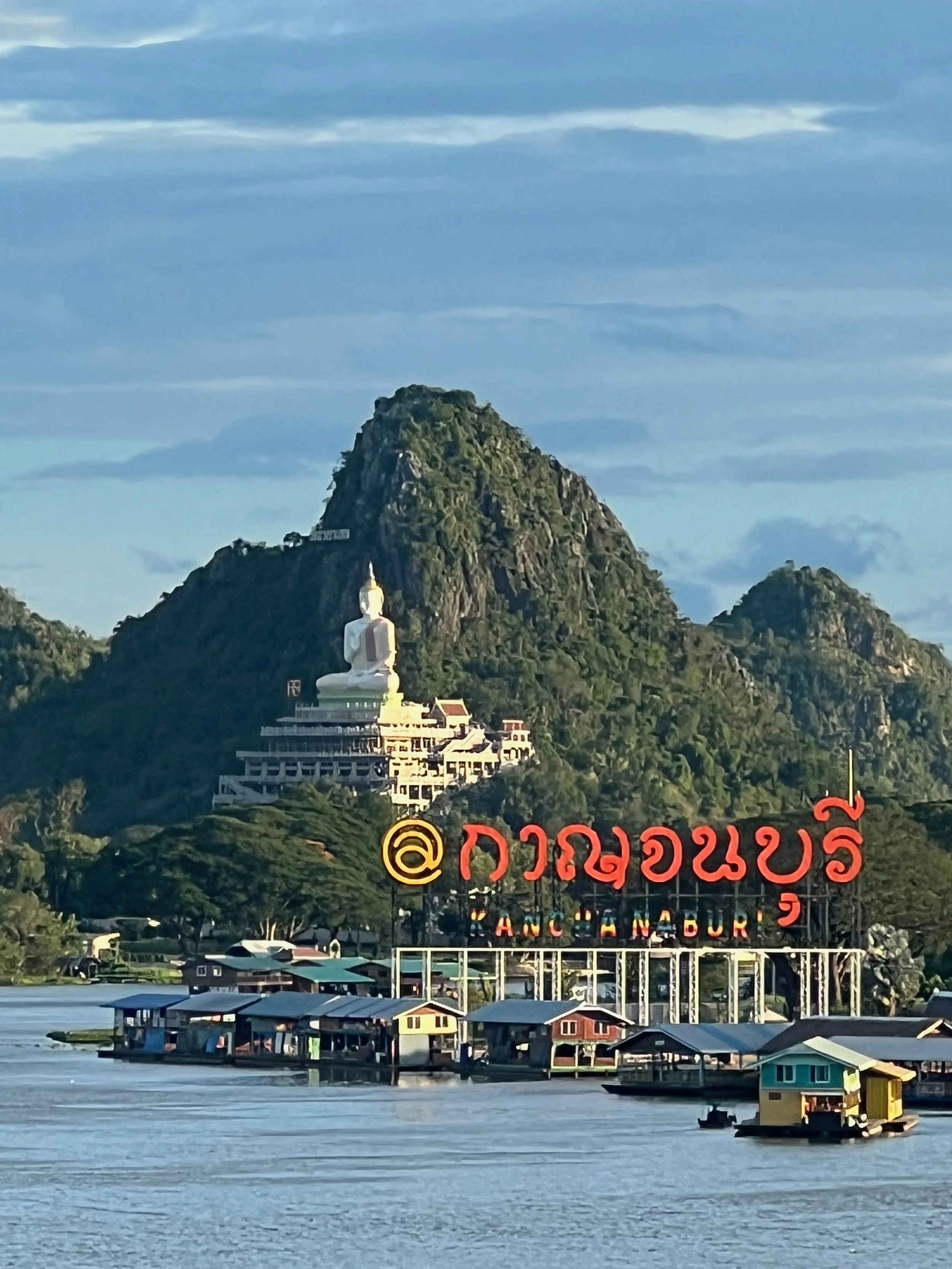 Wat Tham Khao Laem and Buddha from Skywalk ( the big sign says: Kanchanaburi )
