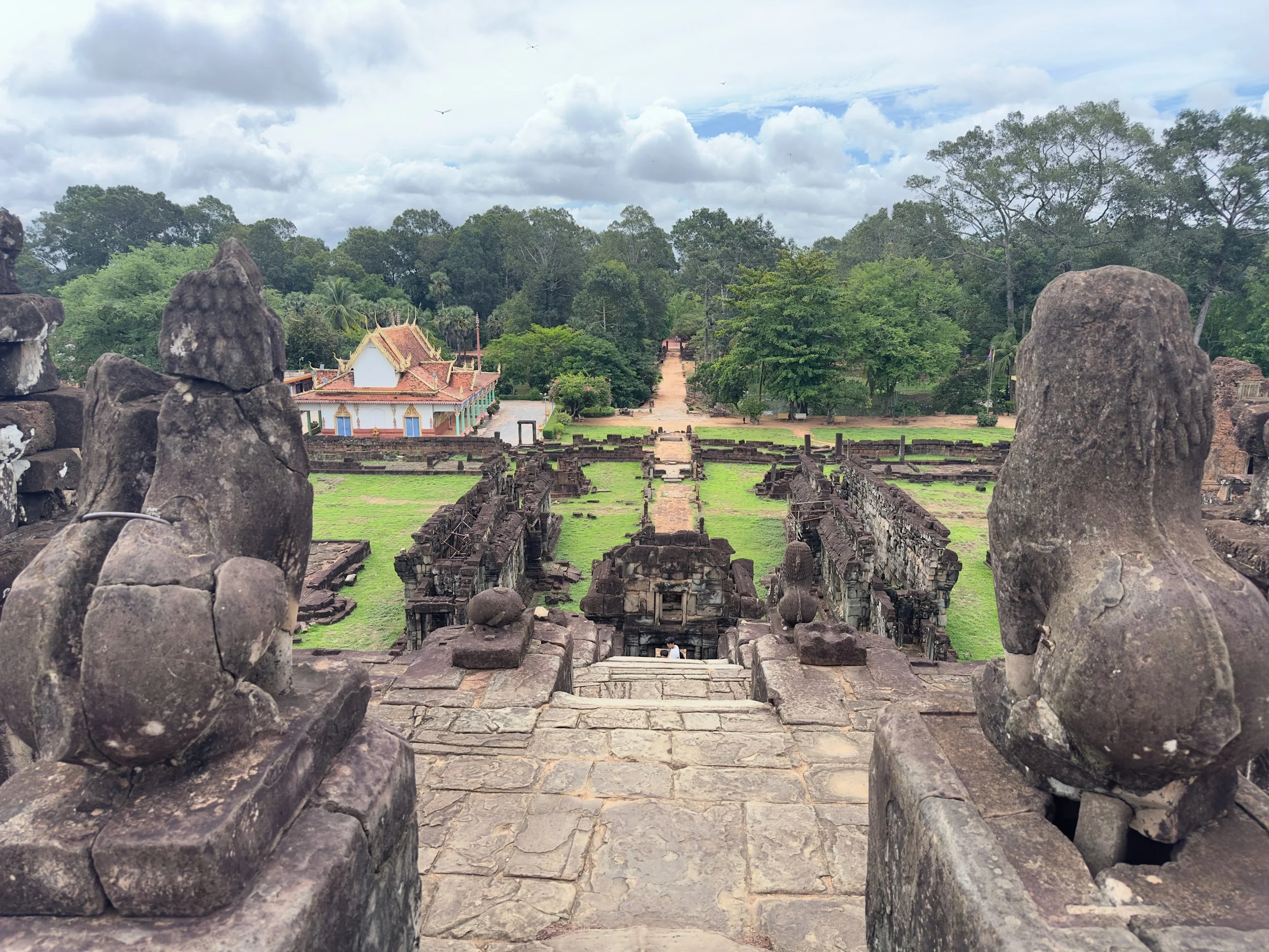 Looking back towards the entry we came in, the building on the left is a modern temple, Bakong Temple