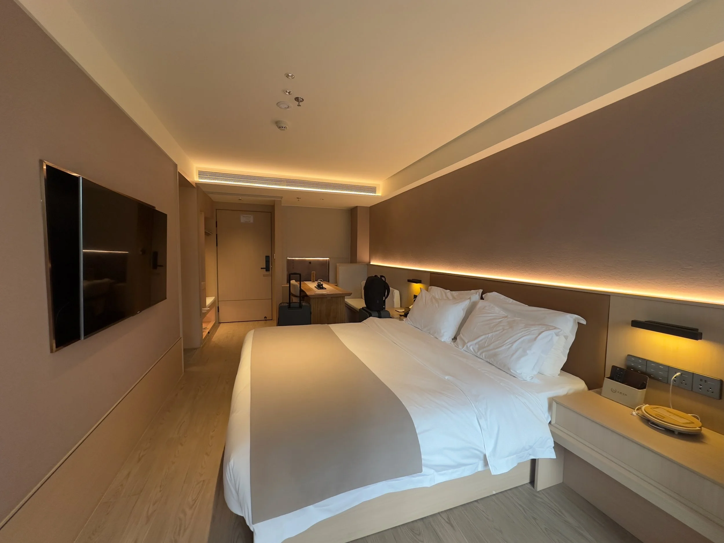 Room 604, bathroom the left behind the TV