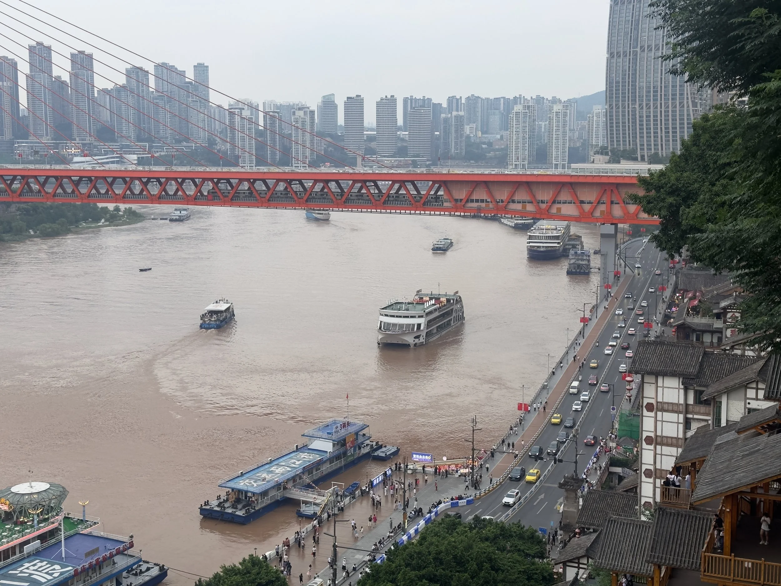View of Jialing River looking east to Qiansimen Bridge.  Hongyadong is the building bottom right