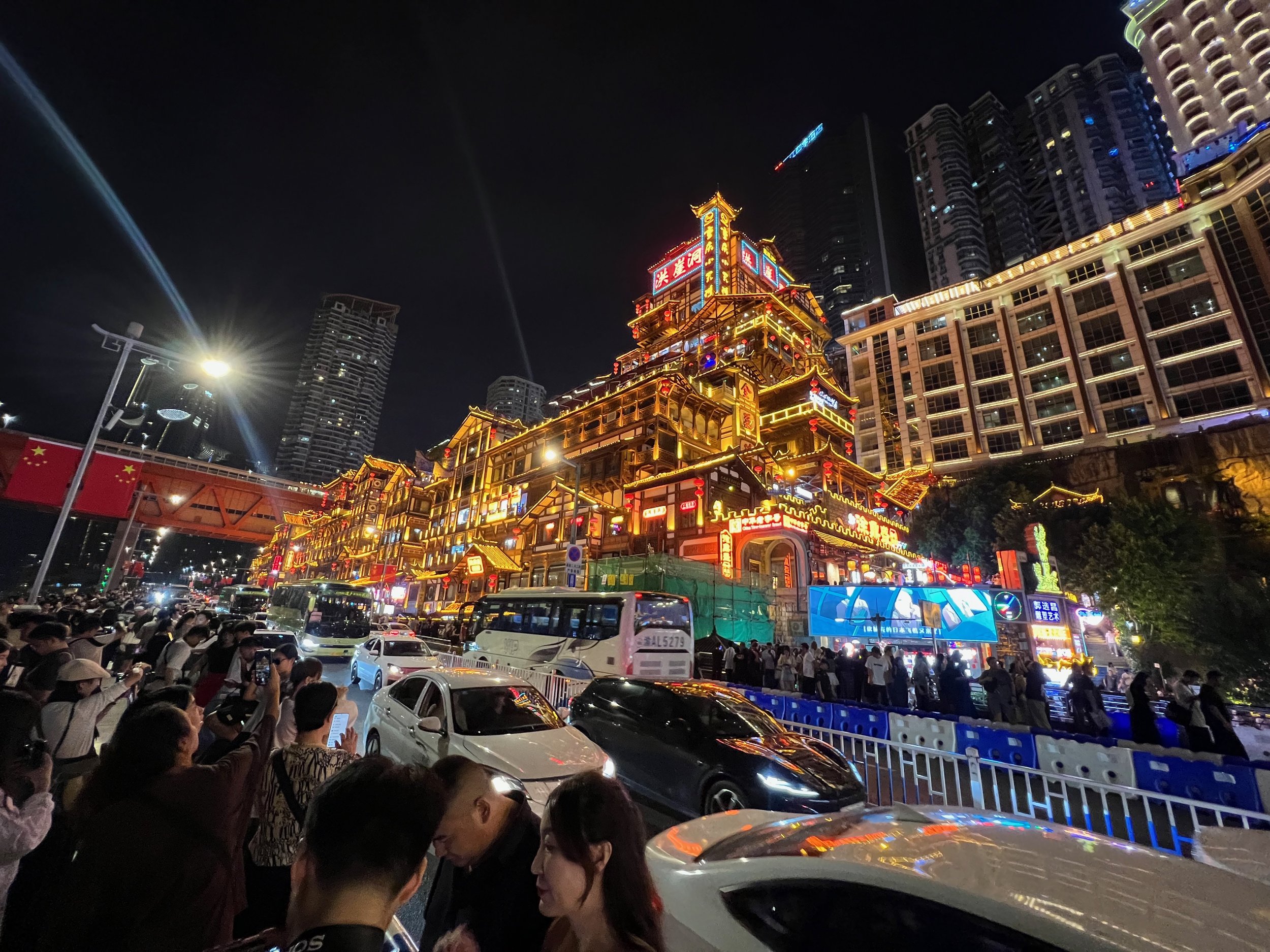 Hongyadong from the street with some of the crowd and traffic jam