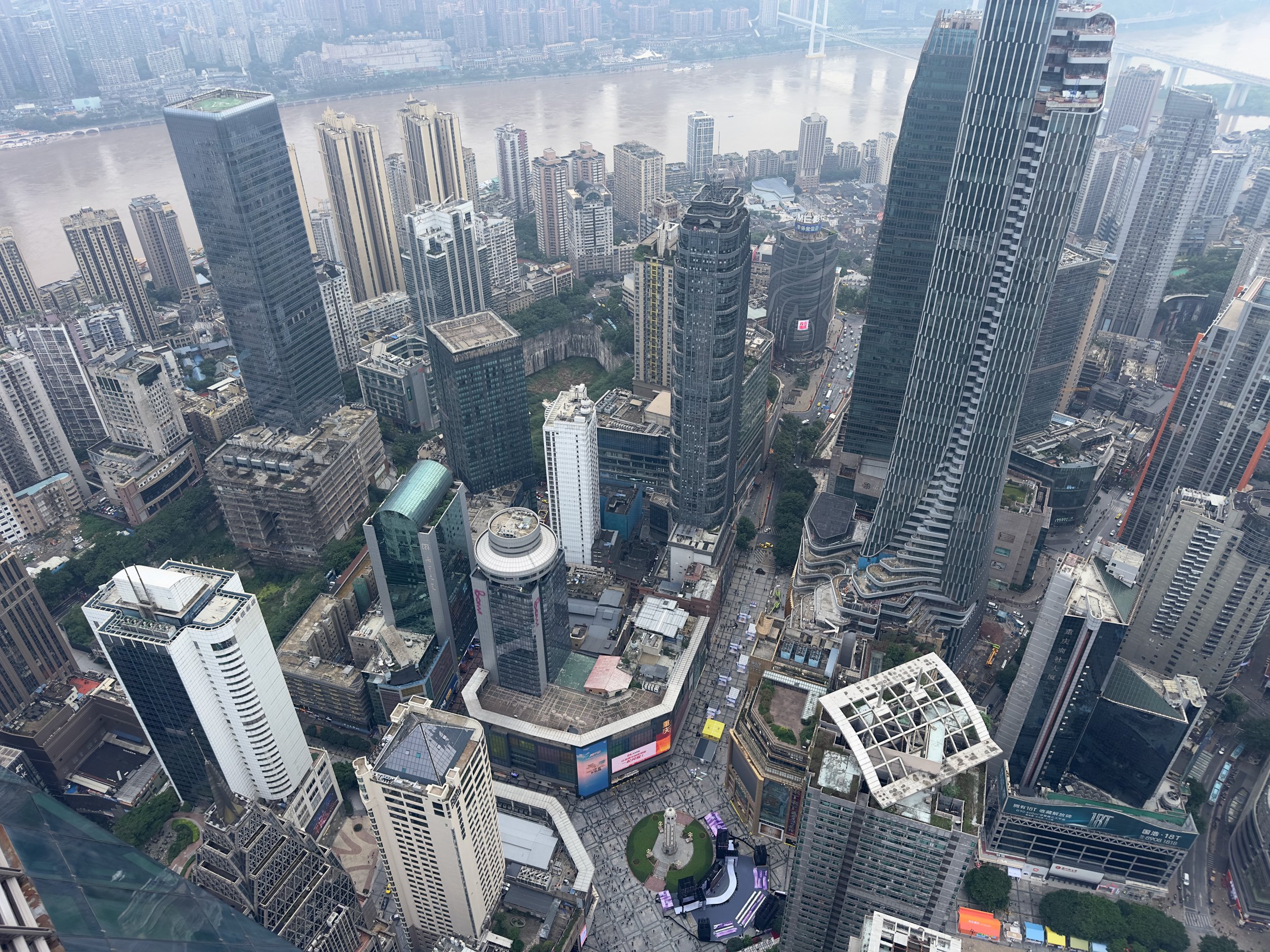 Looking down on the Jiefangbei Monument and pedestrian streets, and the Yangtze River