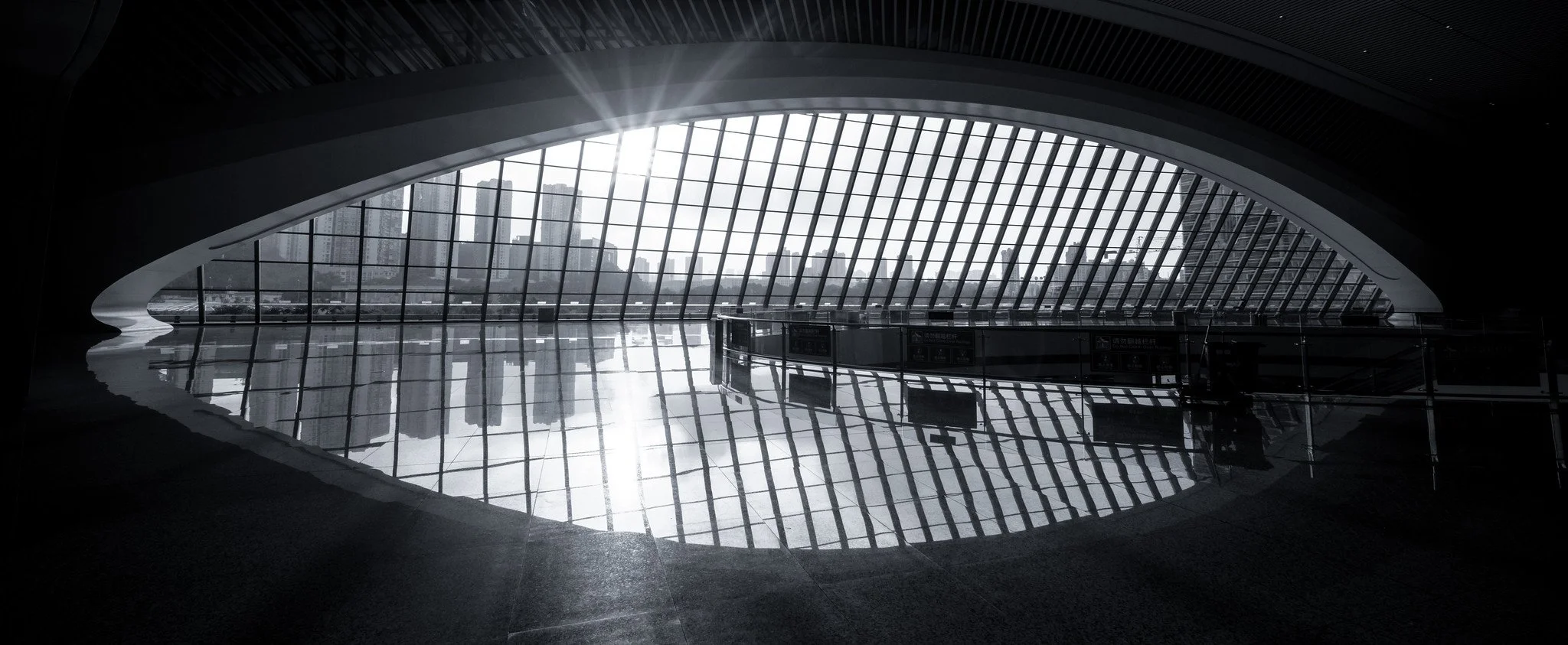 Through the mirrored arch window