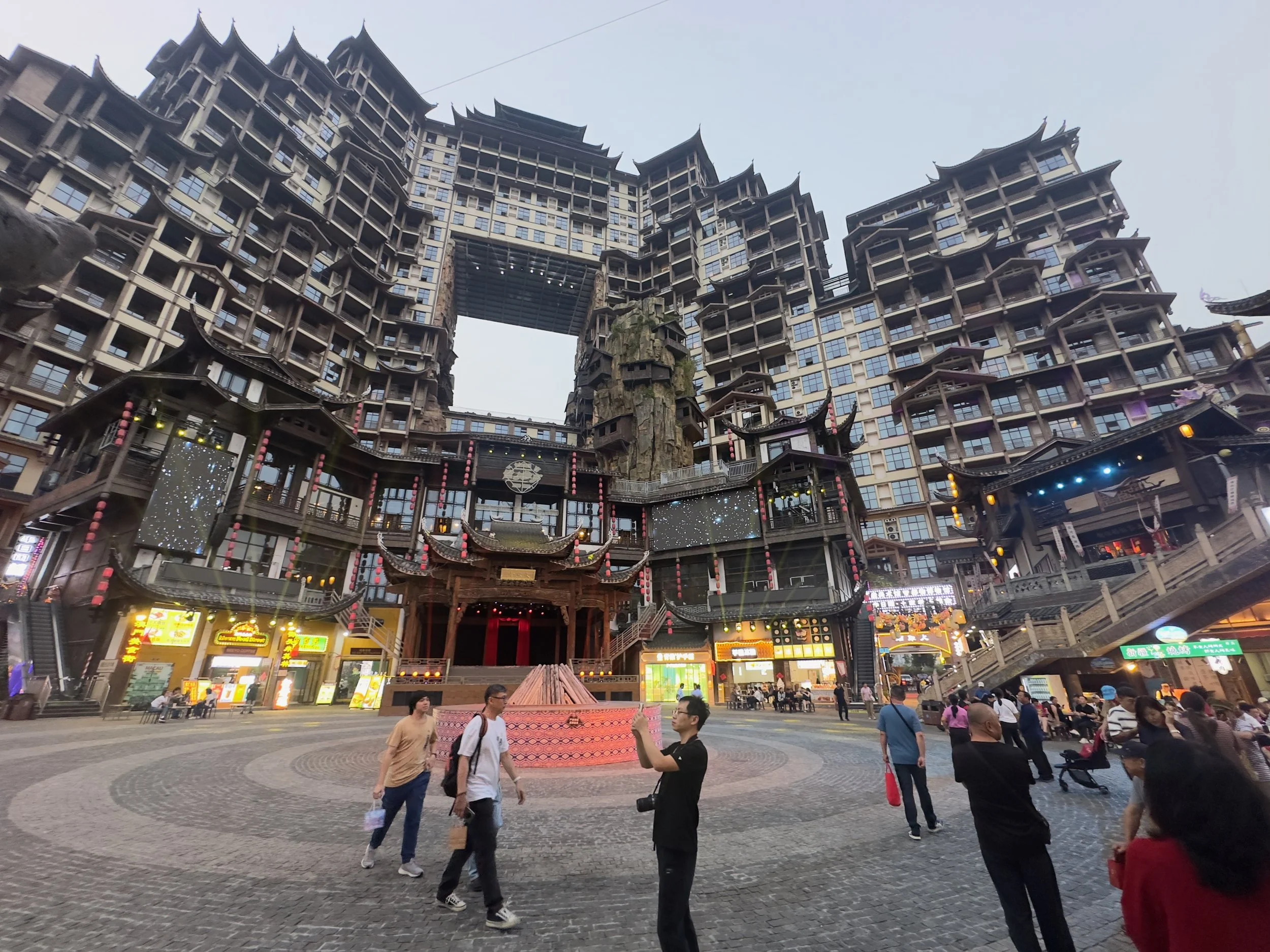 The main building/hotel with a stage at ground floor level