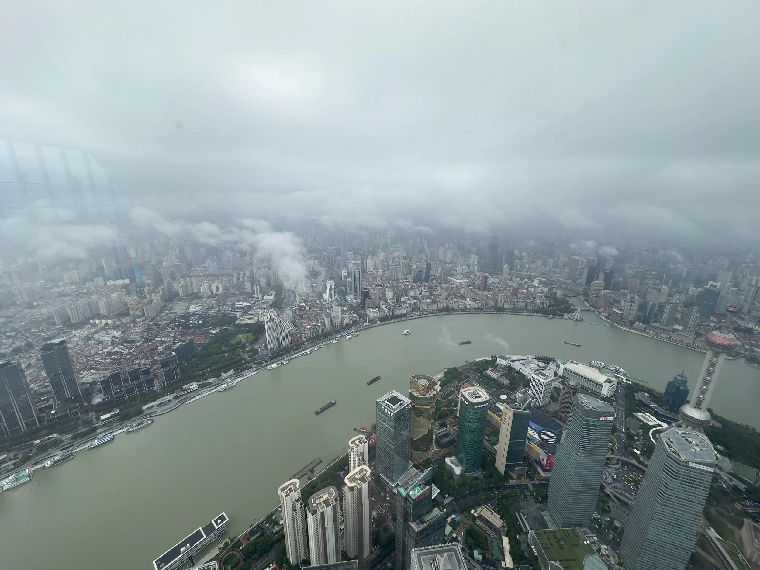 Looking at Huangpu River and the Bund Area, with Pudong Area in the foreground ( NW )
