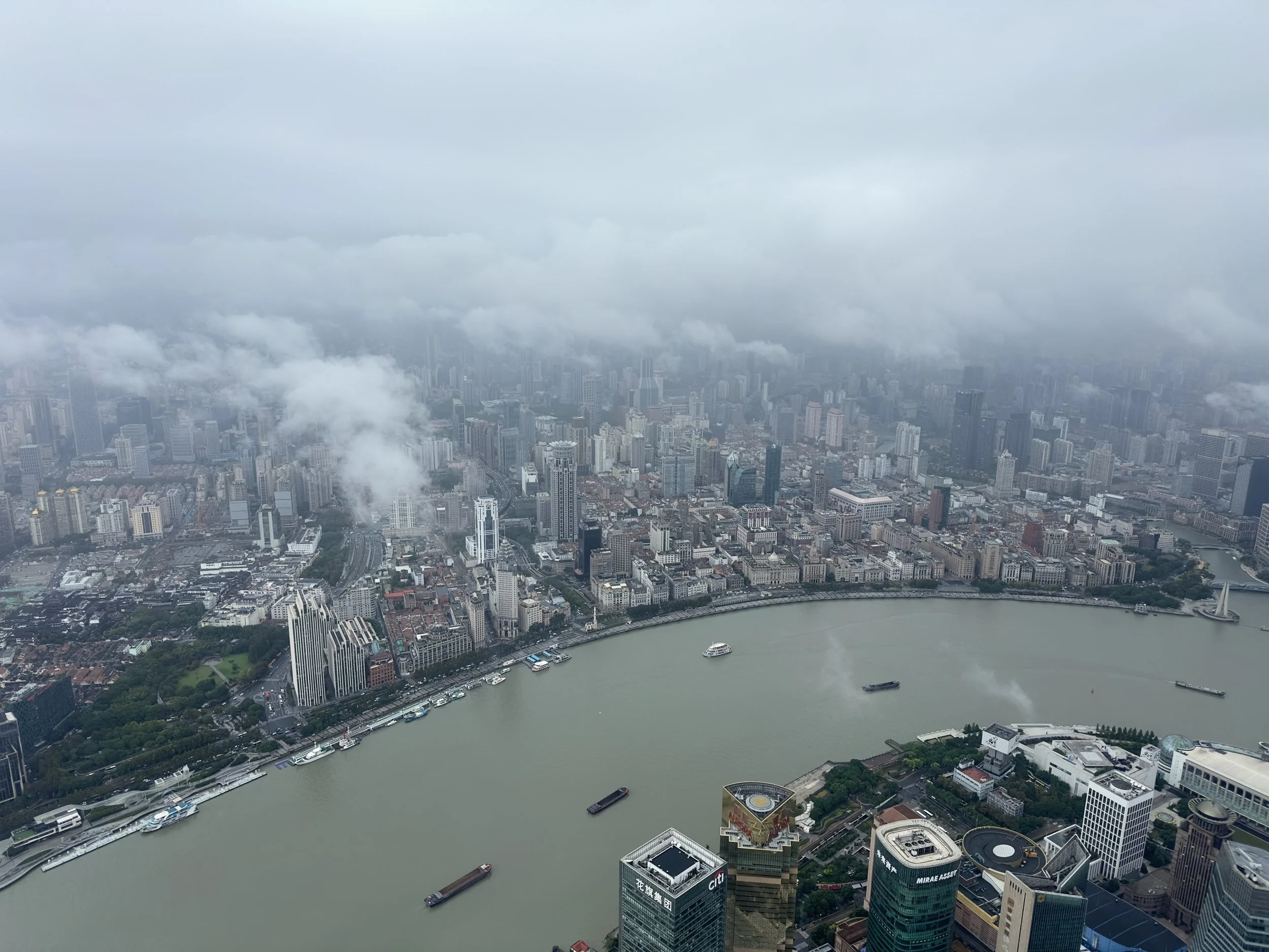 Looking at Huangpu River and the Bund Area ( NW )