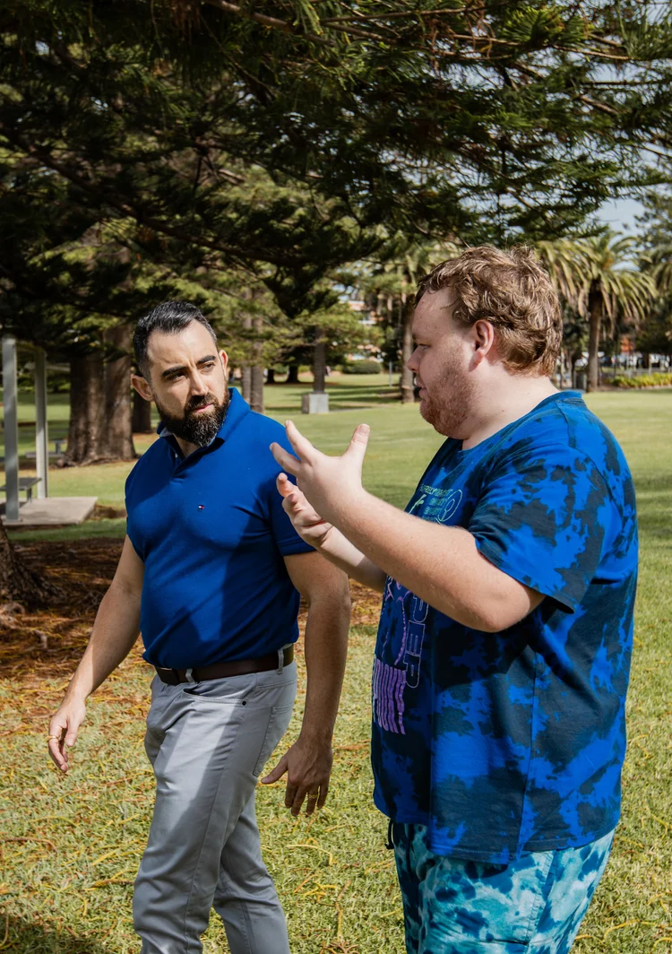 Nick chatting with a participant outdoors