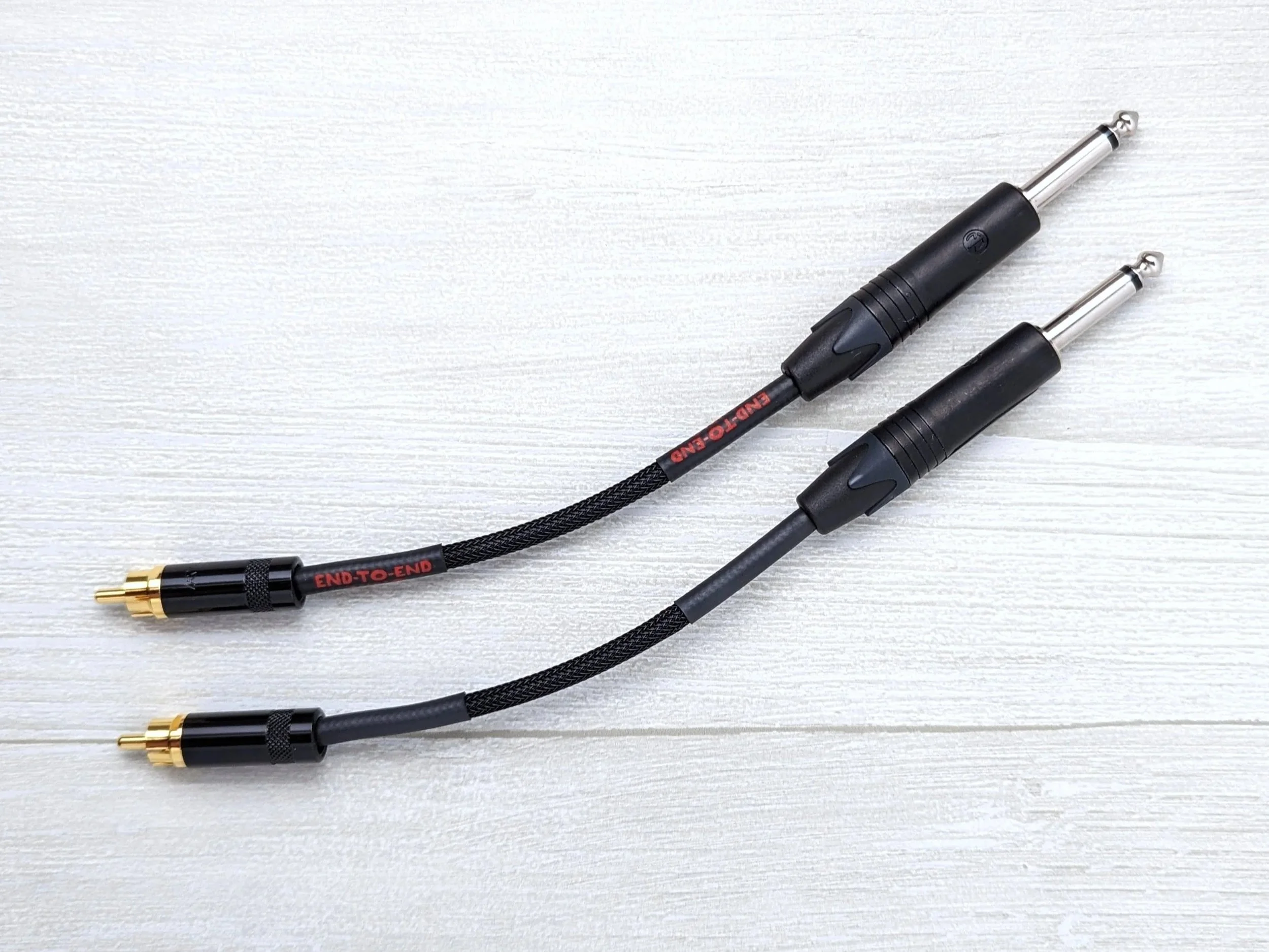 Auxiliary Patch Cables; Dual Neutrik/Rean RCA to Neutrik 1/4" TS, Mogami Cable, Techflex Sleeve. 