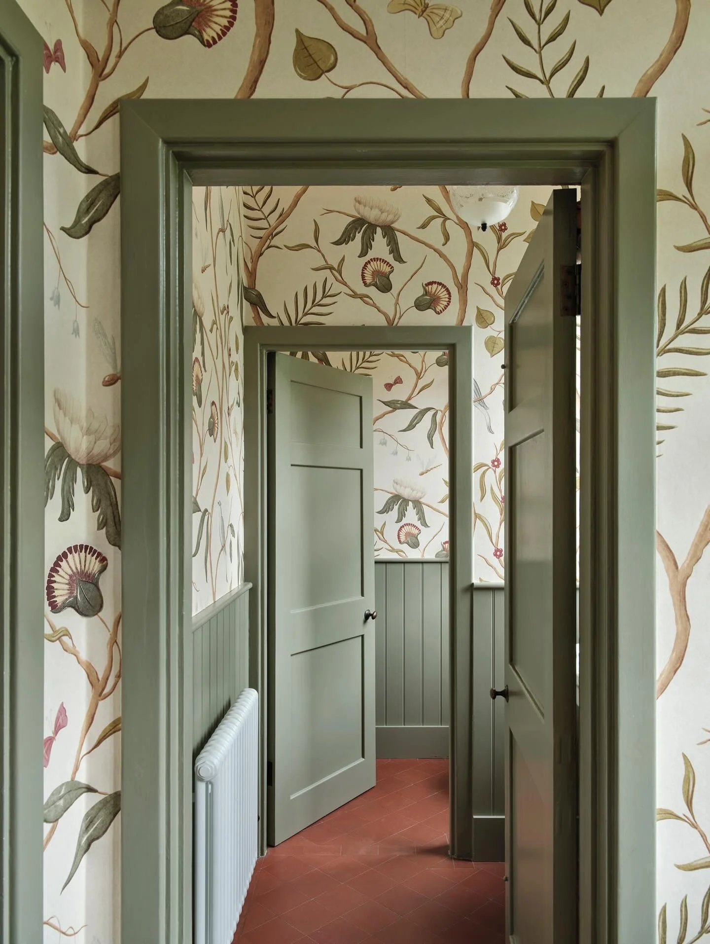 On the threshold of a brand new year it seemed the right time to share again my favourite doorway shot. Beautifully captured by @astridtemplier for @countryhomesmag and featuring @lewisandwood glorious &lsquo;Adam&rsquo;s Eden&rsquo; and @edwardbulme