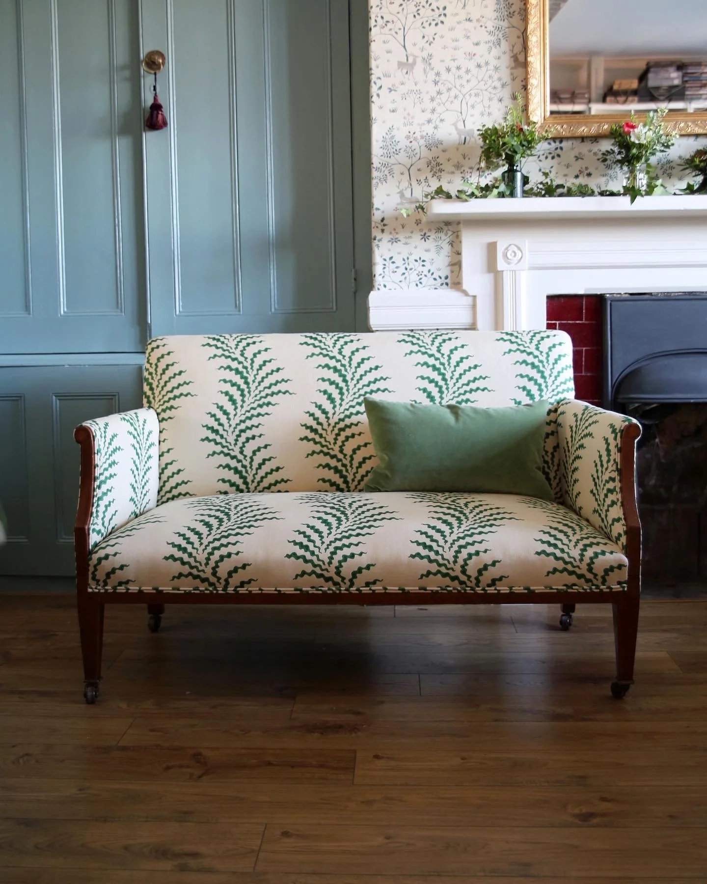 Antique sofa reupholstered in Soane green fern print