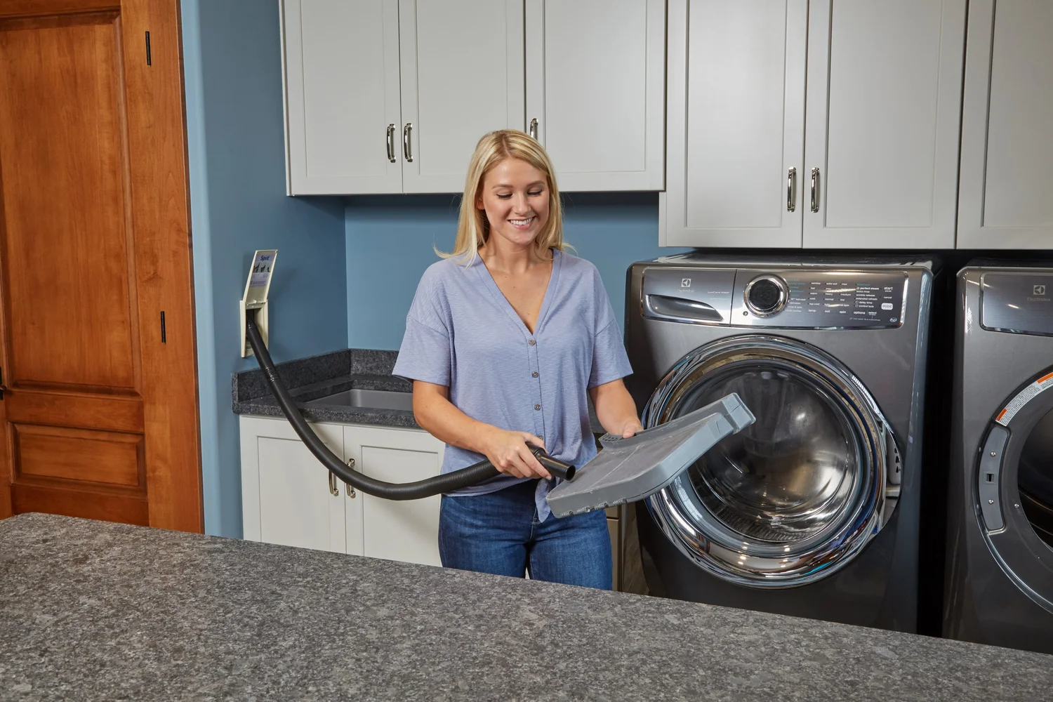 Cleaning dryer lint with central vacuum hose