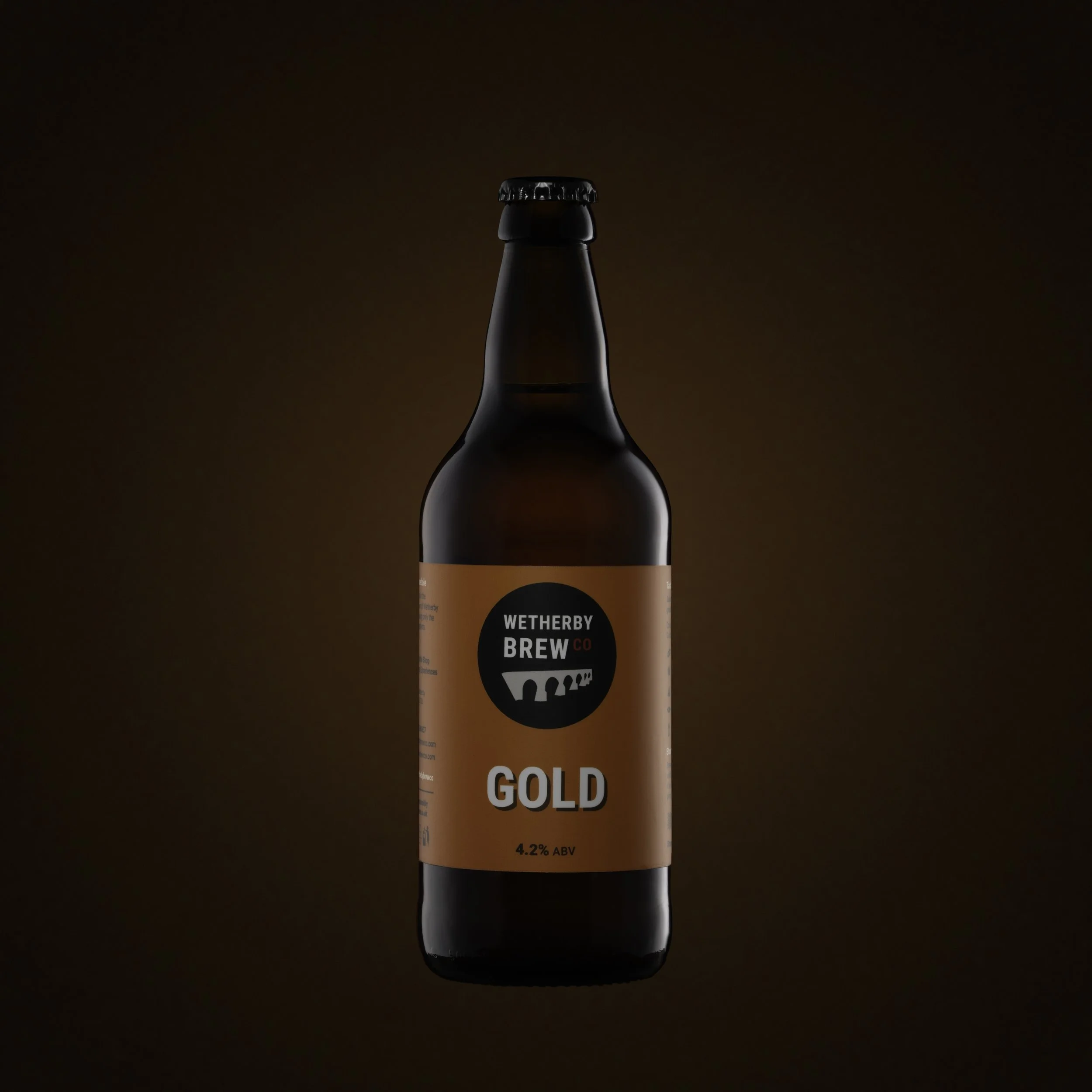 Brewco Gold bottle Orange Light Background Banding Reduced.jpg